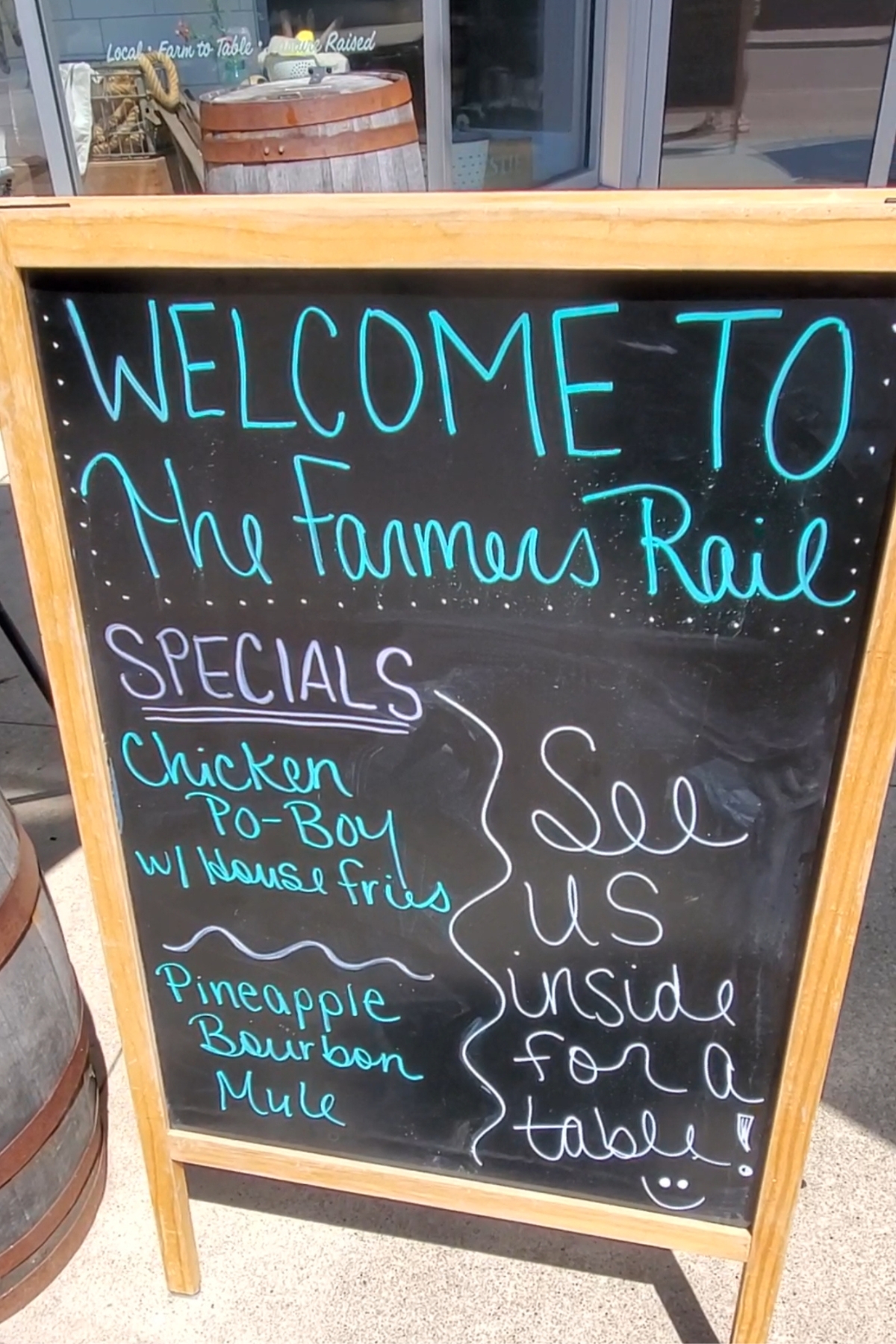 Farmer's Rail restaurant sign outside with the specials listed