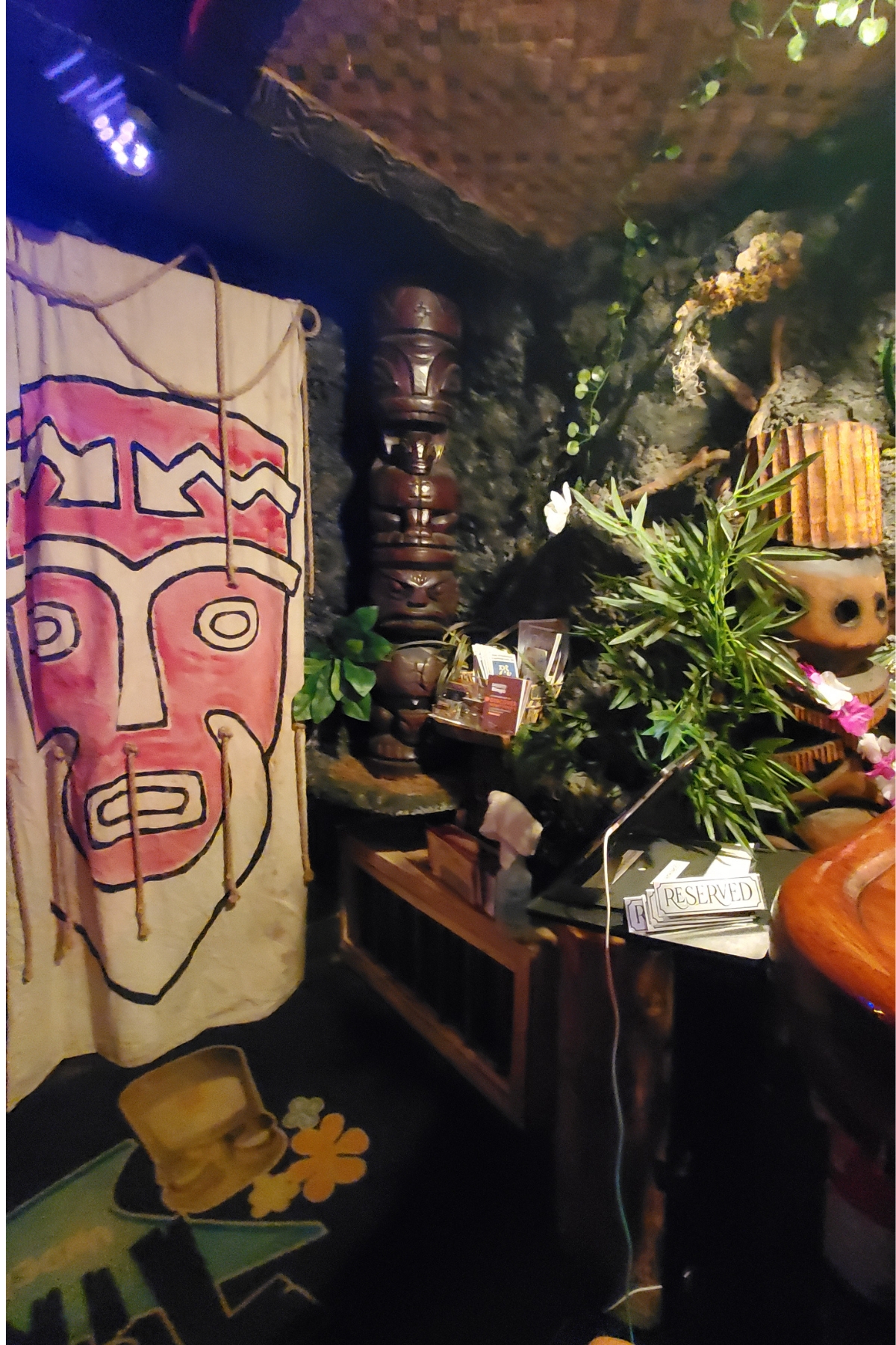 Tiki statues inside Tiki Underground bar at Cuyahoga Falls